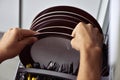 Young man putting a dishwashing machine Royalty Free Stock Photo