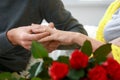 Young man putting engagement ring on fiancee's finger, closeup Royalty Free Stock Photo