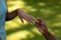 Young man putting wedding ring woman finger Royalty Free Stock Photo