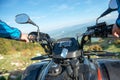 Young man on quad bike on a countryside trail. View from a quad bike. Royalty Free Stock Photo