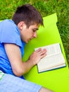 Young Man read a Book Royalty Free Stock Photo