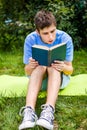 Young Man read a Book Royalty Free Stock Photo