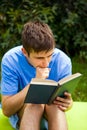 Young Man read a Book Royalty Free Stock Photo