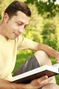 Young man reading the Bible Royalty Free Stock Photo