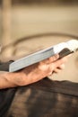 Young man reading the Bible on a park bench Royalty Free Stock Photo