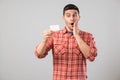 Young man reading business card Royalty Free Stock Photo