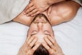 Young man receiving head massage Royalty Free Stock Photo
