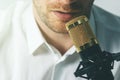 man recording podcast. speaking in microphone closeup Royalty Free Stock Photo
