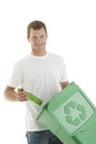 Young man recycling glass bottles Royalty Free Stock Photo
