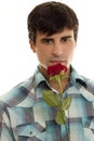 Young man with red rose Royalty Free Stock Photo