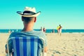 Young man relaxing on the beach Royalty Free Stock Photo