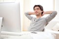 Young man relaxing during a break at the office Royalty Free Stock Photo