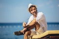 Young man relaxing at sea beach Royalty Free Stock Photo