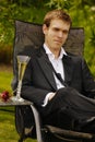 Young man relaxing in tuxedo Royalty Free Stock Photo