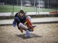 Young man reliving his childhood in playground