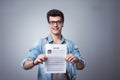 Young man with resume Royalty Free Stock Photo