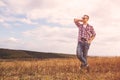 Young Man with retro photo camera outdoor hipster Lifestyle Royalty Free Stock Photo