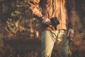 Young Man with retro photo camera outdoor hipster Lifestyle Royalty Free Stock Photo