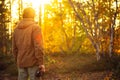 Young Man with retro photo camera outdoor Travel Lifestyle Royalty Free Stock Photo