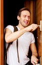 Young man returning home from work or trip Royalty Free Stock Photo