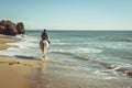 young man ride a white horse on the beach Royalty Free Stock Photo