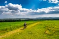 Man Rides Mountainbike In Rural Landscape In Front Of Skyline Of Vienna In Austria Royalty Free Stock Photo