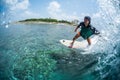 Young man rides the ocean wave Royalty Free Stock Photo