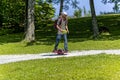 The young man rides on Onewheel
