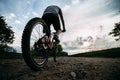 Young man riding bicycle along a country road Royalty Free Stock Photo