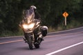 Young man riding big motorcycly on asphalt road use Royalty Free Stock Photo