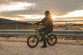 Young man riding a bmx bike. BMX rider. Urban sports Royalty Free Stock Photo