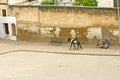 Young man riding a donkey near the ancient medina of Fez, Morocco Royalty Free Stock Photo