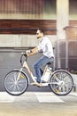 Young man riding electric bicycle Royalty Free Stock Photo