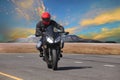 young man riding motorcycle in asphalt road curve use for extreme sport leisure Royalty Free Stock Photo