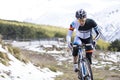 Young man riding a mountain bike