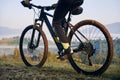 Young man riding a mountain bike downhill style in early morning Royalty Free Stock Photo