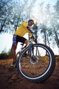 Young man riding mountain bike mtb in jungle track use for sport