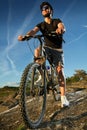 Young man riding mountain bike Royalty Free Stock Photo