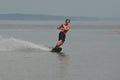 Young Man Riding a Wakeboard in Maine`s Casco Bay Royalty Free Stock Photo