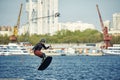 Young man riding wakeboard on a summer lake Royalty Free Stock Photo