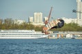 Young man riding wakeboard on a summer lake Royalty Free Stock Photo