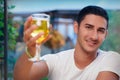 Young Man Rising a Glass in a Bar Royalty Free Stock Photo