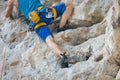 Young man rock climbing on white mountain Royalty Free Stock Photo