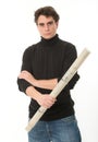 Young man with roll of blueprints Royalty Free Stock Photo