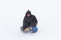 Young man with roller coaster rides in the winter Royalty Free Stock Photo