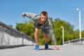 Young man running across city bridge Royalty Free Stock Photo