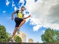 Young man running in park Royalty Free Stock Photo