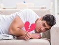 Young man in sad saint valentine concept Royalty Free Stock Photo