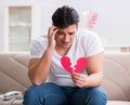 Young man in sad saint valentine concept Royalty Free Stock Photo