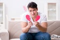 The young man in sad saint valentine concept Royalty Free Stock Photo